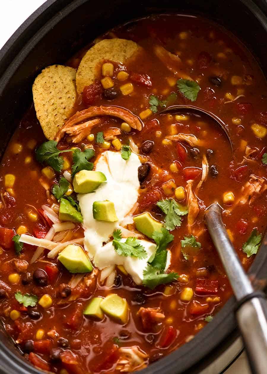Slow Cooker Mexican Chicken Soup being cooked in a slow cooker