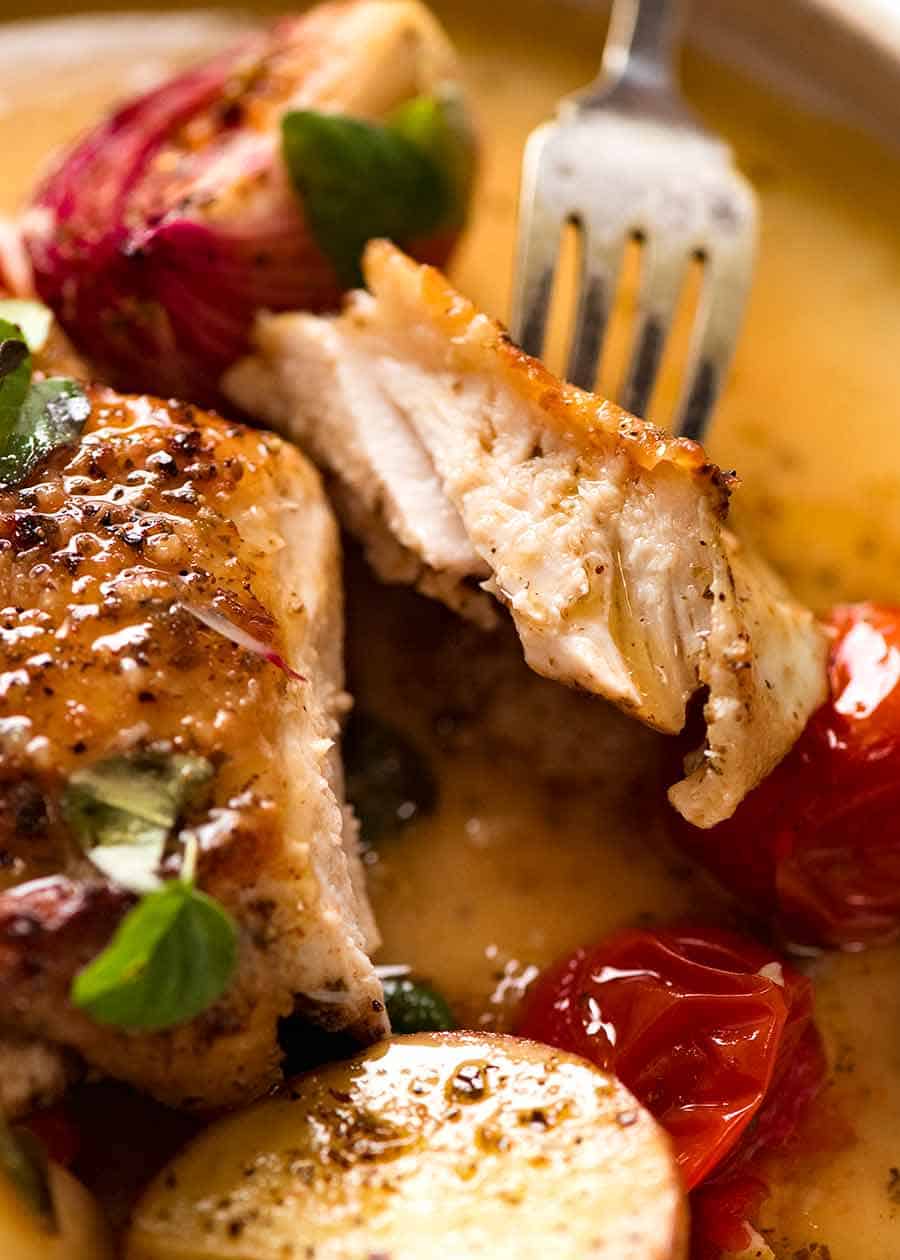 Close up showing the juicy chicken - Mediterranean Baked Chicken and Potatoes