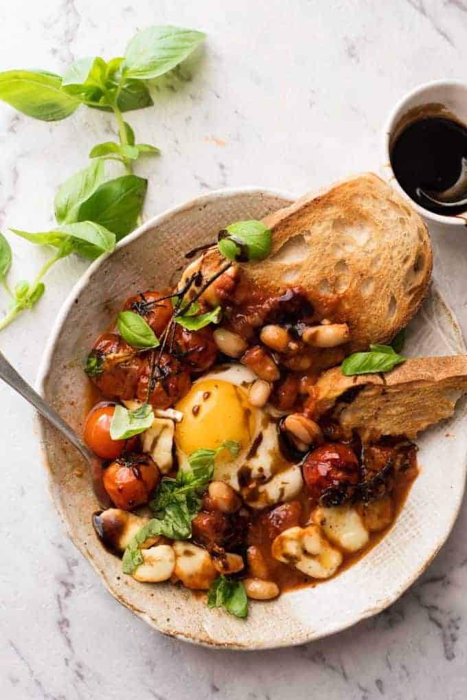 Caprese Baked Eggs with toast and balsamic