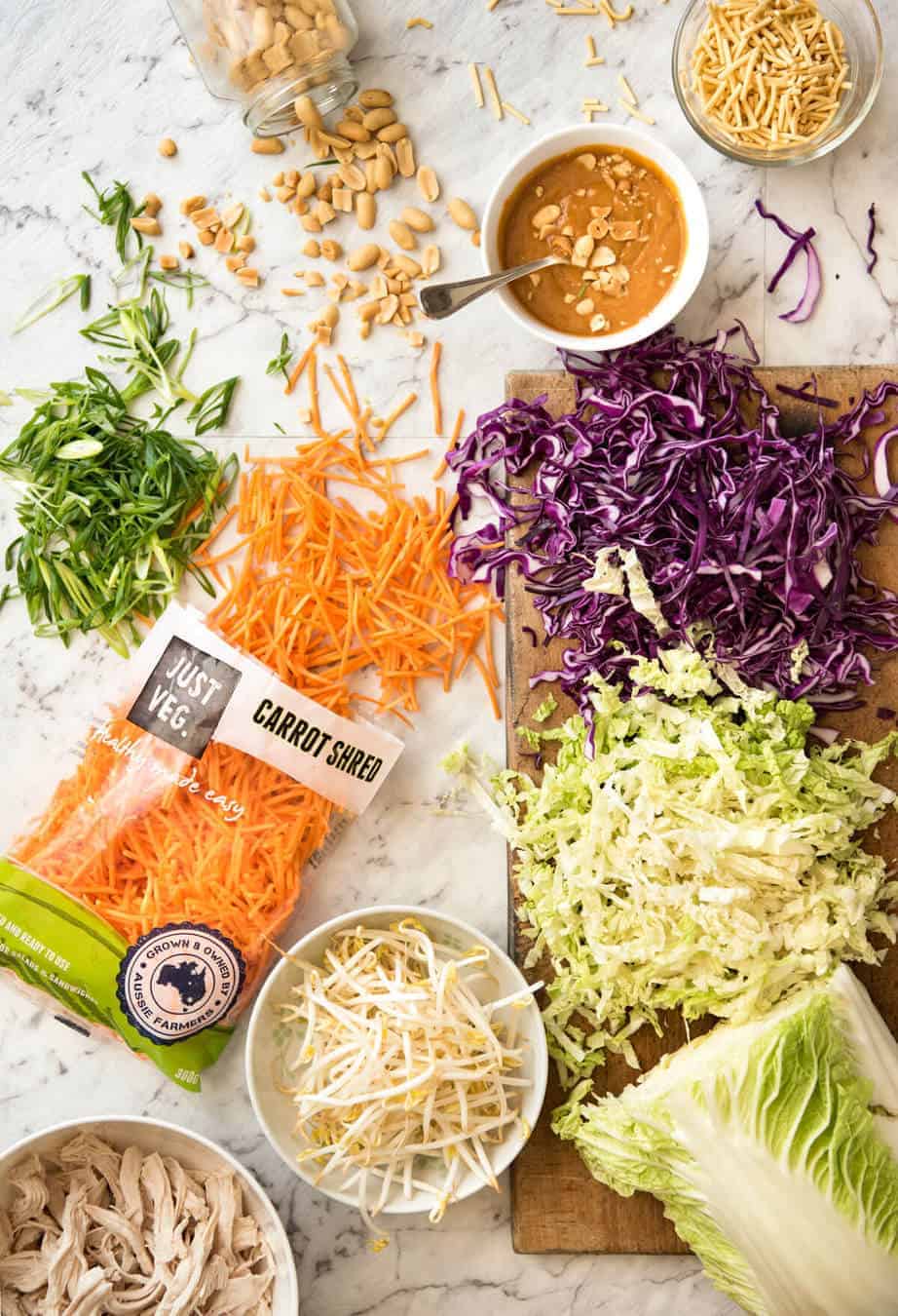 Chinese Chicken Salad with Asian Peanut Salad Dressing - made with cabbage, shredded chicken, crunchy noodles, carrot and a killer peanut dressing! www.recipetineats.com