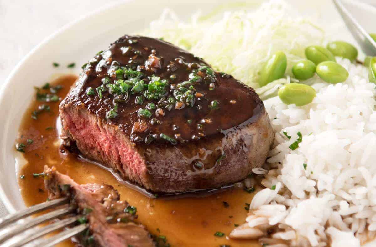 Simple yet stunning Asian Steak with a sauce inspired by the great Tetsuya! All you need is 15 minutes, soy sauce, mirin, sake or sherry, butter, garlic and ginger. Amazing! www.recipetineats.com