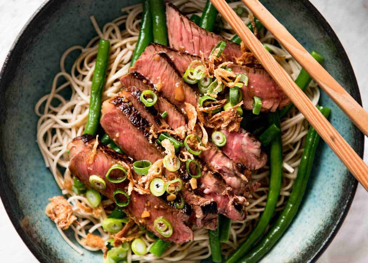 Beef Soba Noodle Bowl - Super quick to make and tastes absolutely incredible. The dressing is so tasty! www.recipetineats.com