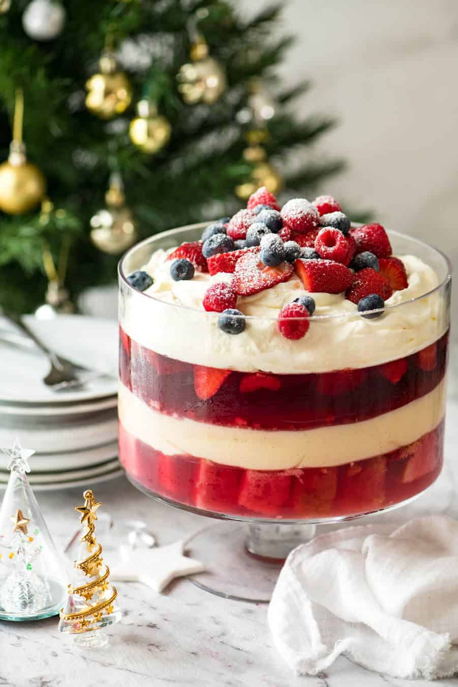 Beautiful, easy Christmas Trifle with Cranberry Juice Jelly, custard, lots of cream and berries! www.recipetineats.com