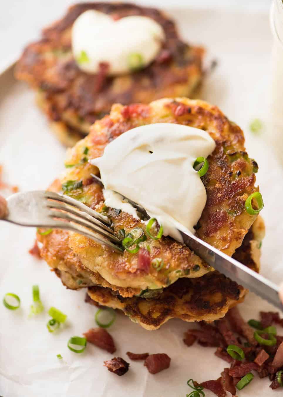 Cheese and Ham Pancakes - golden crispy cheesy outsides, fluffy insides with pops of ham (or bacon). These are epic! www.recipetineats.com
