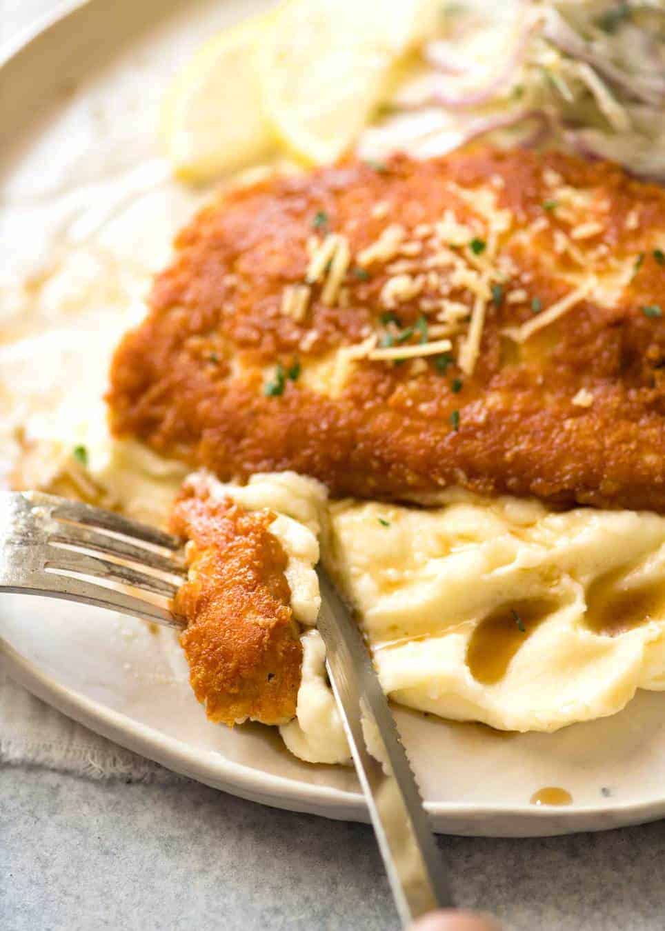Parmesan Crusted Chicken Breast - golden brown and crispy on the outside, juicy on the inside.