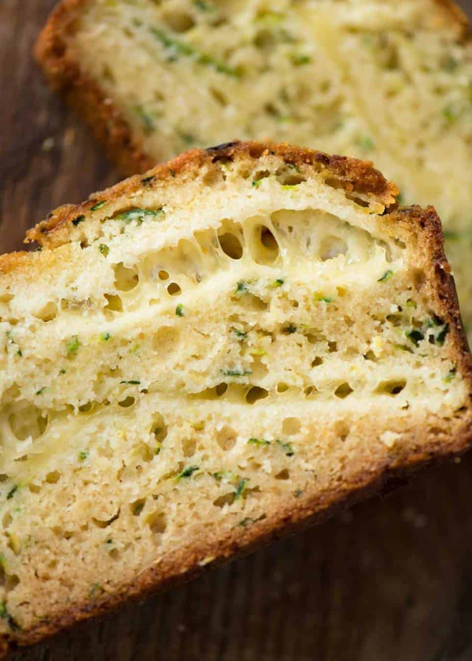 A Cheesy Zucchini Bread that's quick to make (no yeast) and is so moist, you'll scoff it down even without slathering it with butter! www.recipetineats.com