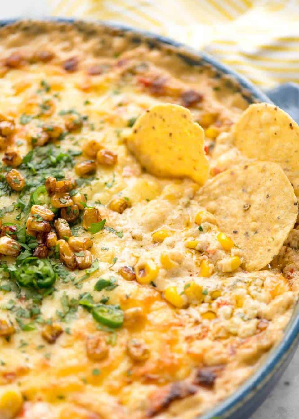 Essential Super Bowl food - a big batch Hot Corn Dip that's made for eating with eyes glued to the TV screen.
