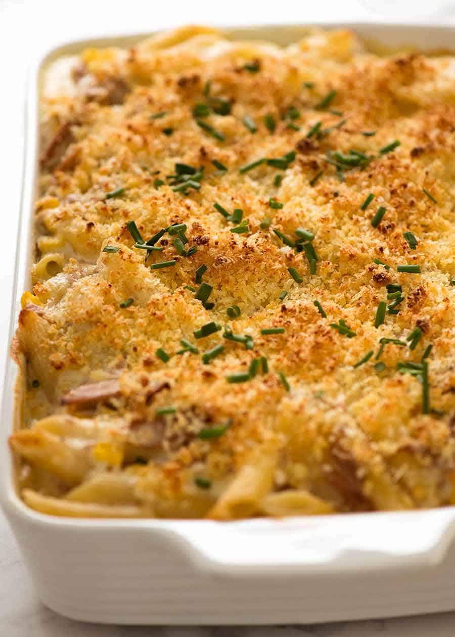 Creamy Tuna Pasta Bake in a white baking dish, fresh out of the oven