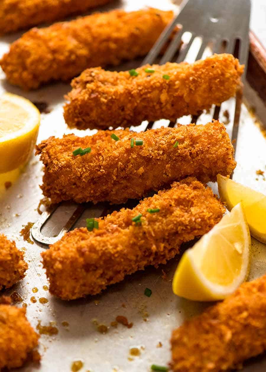 Oven baked Fish fingers on a tray, fresh out of the oven